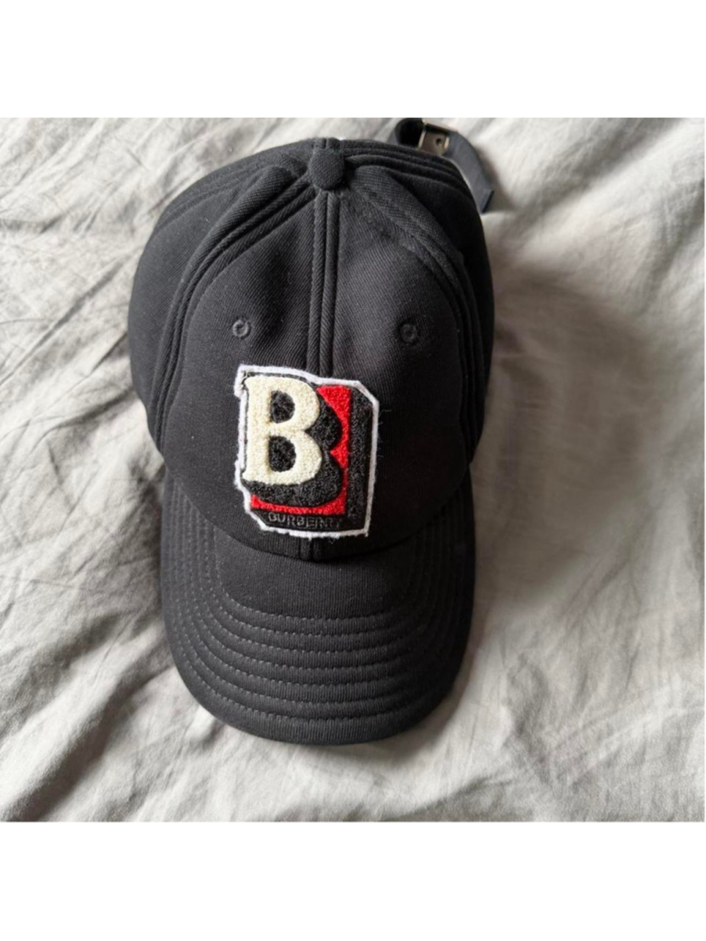 Black Burberry baseball cap with white star and red outline #baseballcap #luxury